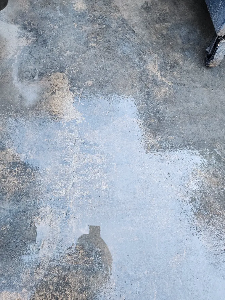 Dumpster pad degreased and pressure washed clean at a restaurant in Bend, Oregon