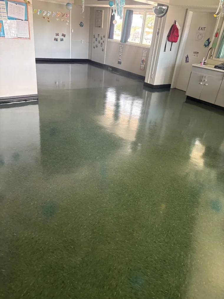 Commercial VCT floor after strip and wax, restored to a high gloss, at a daycare in Redmond, Oregon