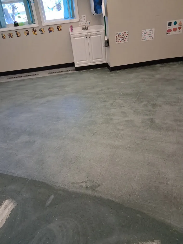 Commercial VCT floor before strip and wax at a daycare in Redmond, Oregon
